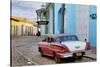 Colorful Buildings and 1958 Chevrolet Biscayne, Trinidad, Cuba-Adam Jones-Stretched Canvas