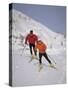 Colorful Couple Cross Country Skiing-null-Stretched Canvas