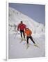 Colorful Couple Cross Country Skiing-null-Framed Photographic Print