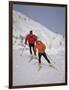 Colorful Couple Cross Country Skiing-null-Framed Photographic Print