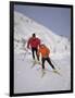 Colorful Couple Cross Country Skiing-null-Framed Photographic Print