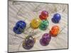 Colorful Glass Floats on Sand Dune, Oregon, USA-Jaynes Gallery-Mounted Photographic Print