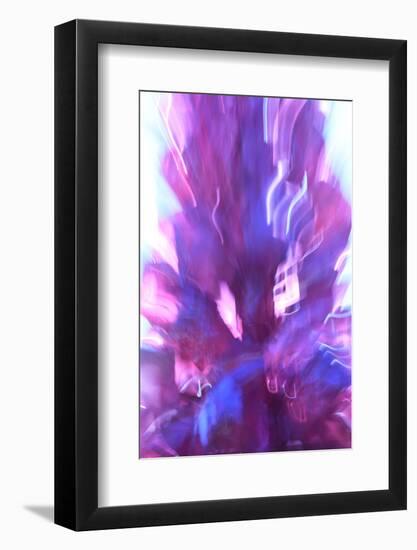 Colorful glass with blurred motion effect.-Stuart Westmorland-Framed Photographic Print