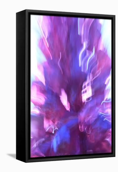 Colorful glass with blurred motion effect.-Stuart Westmorland-Framed Stretched Canvas