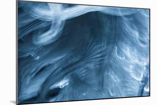 Colorful glass with blurred motion effect.-Stuart Westmorland-Mounted Photographic Print