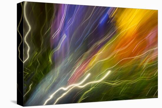 Colorful glass with blurred motion effect.-Stuart Westmorland-Stretched Canvas