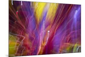 Colorful glass with blurred motion effect.-Stuart Westmorland-Mounted Premium Photographic Print