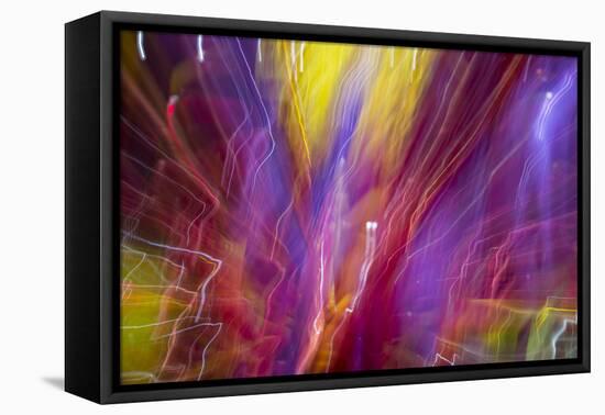 Colorful glass with blurred motion effect.-Stuart Westmorland-Framed Stretched Canvas