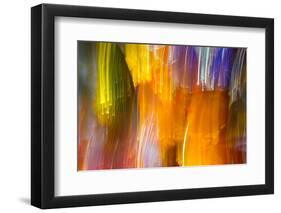 Colorful glass with blurred motion effect.-Stuart Westmorland-Framed Photographic Print