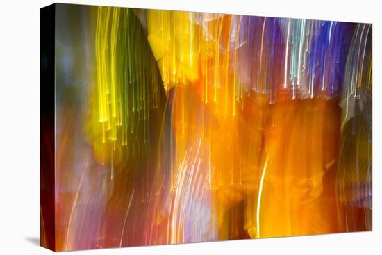 Colorful glass with blurred motion effect.-Stuart Westmorland-Stretched Canvas