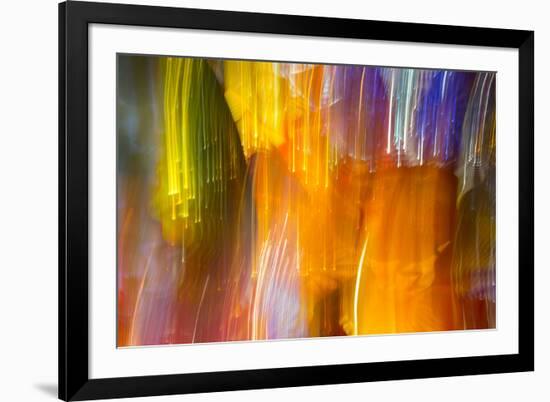 Colorful glass with blurred motion effect.-Stuart Westmorland-Framed Premium Photographic Print