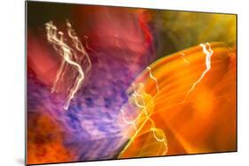 Colorful glass with blurred motion effect.-Stuart Westmorland-Mounted Photographic Print