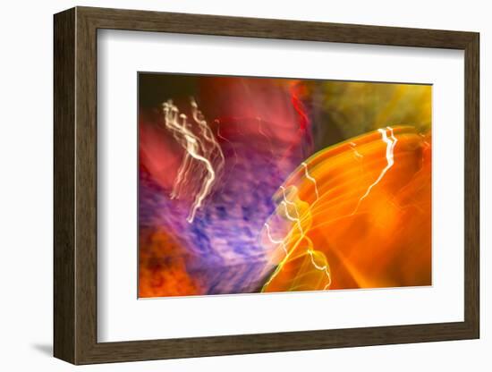 Colorful glass with blurred motion effect.-Stuart Westmorland-Framed Photographic Print