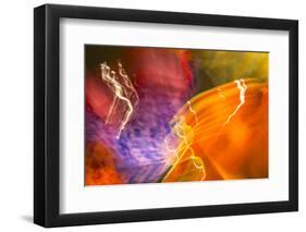 Colorful glass with blurred motion effect.-Stuart Westmorland-Framed Photographic Print