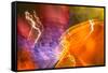 Colorful glass with blurred motion effect.-Stuart Westmorland-Framed Stretched Canvas