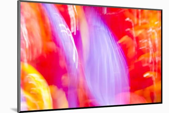 Colorful glass with blurred motion effect.-Stuart Westmorland-Mounted Photographic Print