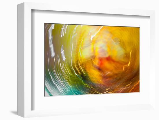 Colorful glass with blurred motion effect.-Stuart Westmorland-Framed Photographic Print