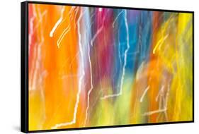 Colorful glass with blurred motion effect.-Stuart Westmorland-Framed Stretched Canvas