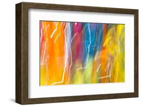 Colorful glass with blurred motion effect.-Stuart Westmorland-Framed Photographic Print