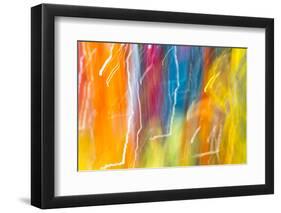 Colorful glass with blurred motion effect.-Stuart Westmorland-Framed Photographic Print