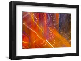 Colorful glass with blurred motion effect.-Stuart Westmorland-Framed Photographic Print