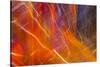 Colorful glass with blurred motion effect.-Stuart Westmorland-Stretched Canvas