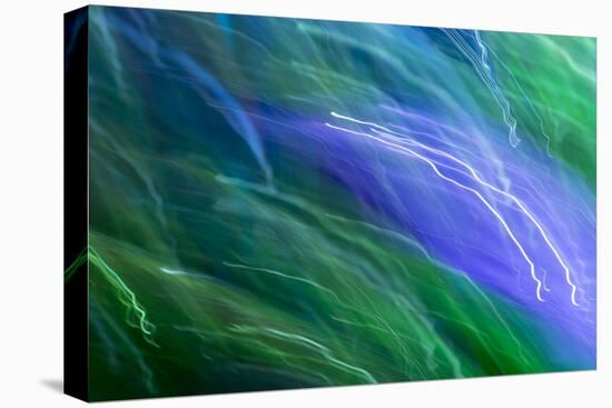 Colorful glass with blurred motion effect.-Stuart Westmorland-Stretched Canvas