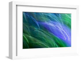 Colorful glass with blurred motion effect.-Stuart Westmorland-Framed Photographic Print