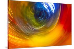 Colorful glass with blurred motion effect.-Stuart Westmorland-Stretched Canvas