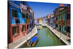 Colorful houses and canal, Burano, Veneto, Italy-Russ Bishop-Stretched Canvas