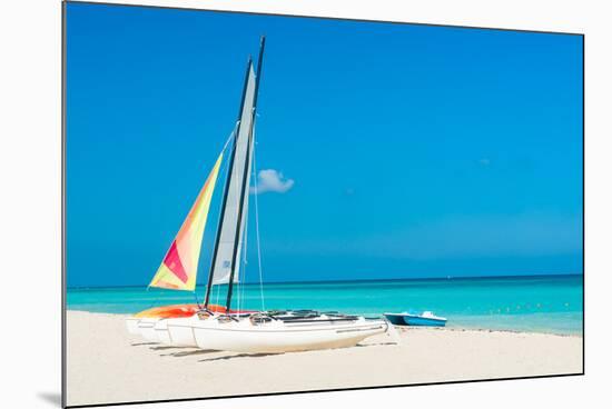 Colorful Sailing Boats for Rent on a Sunny Day at Varadero Beach in Cuba-Kamira-Mounted Photographic Print