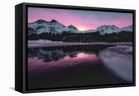 Colorful sky at sunrise on snowcapped mountains and frozen Lake Silvaplana, Maloja, Engadine-Roberto Moiola-Framed Stretched Canvas