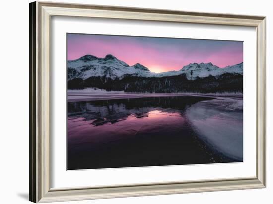 Colorful sky at sunrise on snowcapped mountains and frozen Lake Silvaplana, Maloja, Engadine-Roberto Moiola-Framed Photographic Print