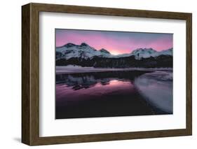 Colorful sky at sunrise on snowcapped mountains and frozen Lake Silvaplana, Maloja, Engadine-Roberto Moiola-Framed Photographic Print