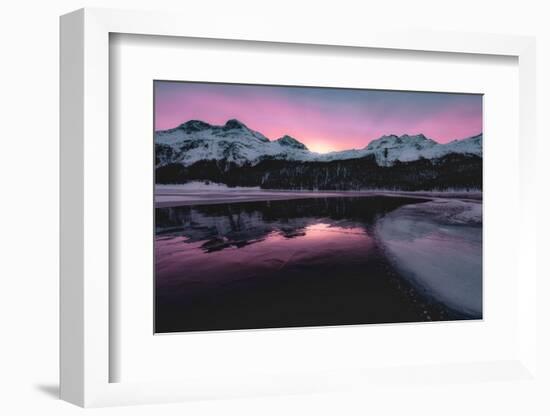 Colorful sky at sunrise on snowcapped mountains and frozen Lake Silvaplana, Maloja, Engadine-Roberto Moiola-Framed Photographic Print