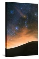 Colorful stars sky in White Sands Monument over Sand Dunes with silhouette and horizon air glow-David Chang-Stretched Canvas