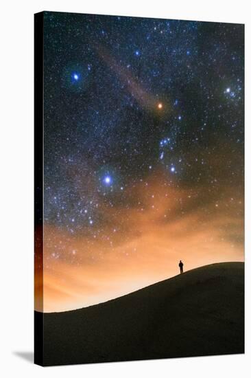 Colorful stars sky in White Sands Monument over Sand Dunes with silhouette and horizon air glow-David Chang-Stretched Canvas