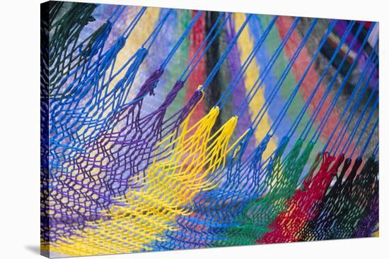 Colorful strings in handmade hammock, Akumal Yucatan, Mexico-Mark Gibson-Stretched Canvas