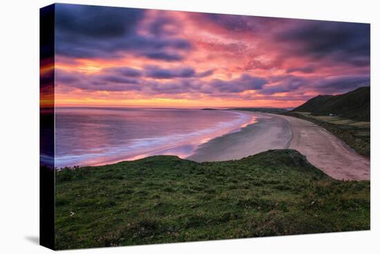 Colorful Sunset over the Beach in Rhossili on the Gower Peninsula, Wales, United Kingdom-Frances Gallogly-Stretched Canvas