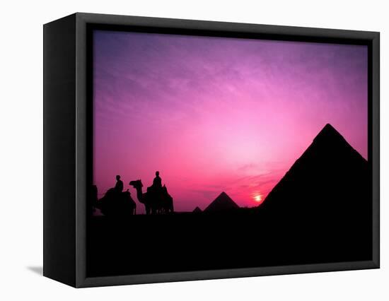 Colorful Sunset Silhouetting Men and Camels at the Great Pyramids of Giza, Egypt-Bill Bachmann-Framed Stretched Canvas