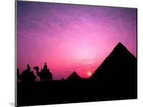 Colorful Sunset Silhouetting Men and Camels at the Great Pyramids of Giza, Egypt-Bill Bachmann-Mounted Premium Photographic Print