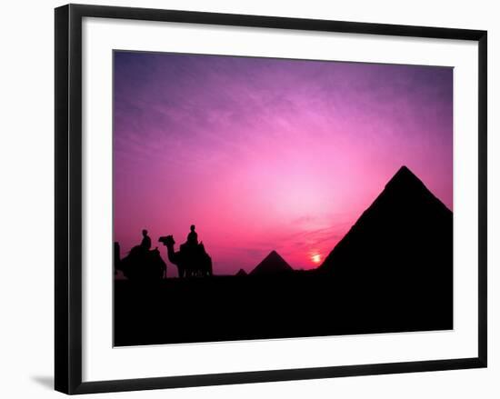 Colorful Sunset Silhouetting Men and Camels at the Great Pyramids of Giza, Egypt-Bill Bachmann-Framed Premium Photographic Print