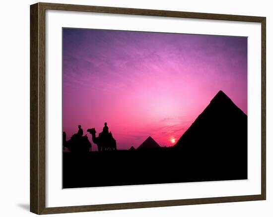 Colorful Sunset Silhouetting Men and Camels at the Great Pyramids of Giza, Egypt-Bill Bachmann-Framed Photographic Print