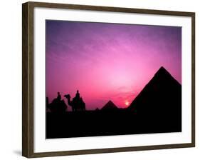 Colorful Sunset Silhouetting Men and Camels at the Great Pyramids of Giza, Egypt-Bill Bachmann-Framed Photographic Print