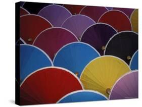 Colorful Umbrellas at Umbrella Factory, Chiang Mai, Thailand-Claudia Adams-Stretched Canvas