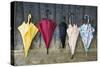 Colorful Umbrellas Leaning against a Wall-Nosnibor137-Stretched Canvas