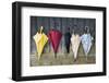 Colorful Umbrellas Leaning against a Wall-Nosnibor137-Framed Photographic Print