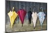 Colorful Umbrellas Leaning against a Wall-Nosnibor137-Mounted Photographic Print