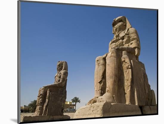 Colossi of Memnon Stand at Entrance to the Ancient Theban Necropolis on West Bank of Nile at Luxor-Julian Love-Mounted Photographic Print