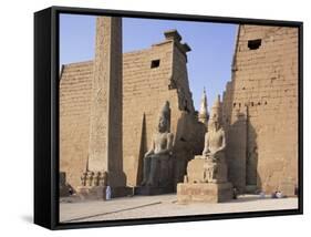 Colossi of Rameses II, Luxor Temple, Luxor, Unesco World Heritage Site, Thebes, Egypt-Peter Scholey-Framed Stretched Canvas